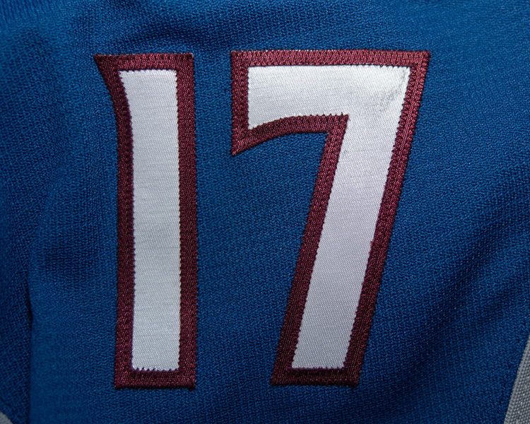 Tyson Jost game worn jersey sleeve number marks Tyson Jost game worn sleeve number marks